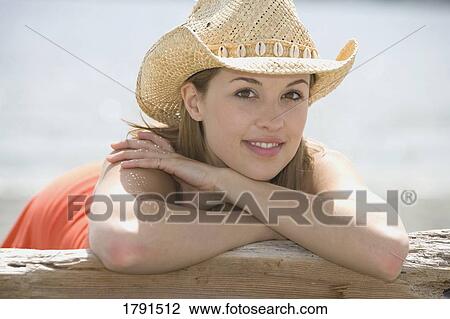 Stock Image - Woman at the beach. Fotosearch
