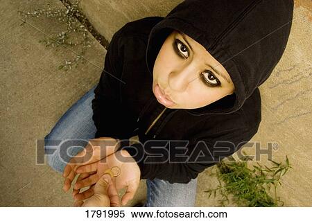 Stock Photography - Woman begging. Fotosearch