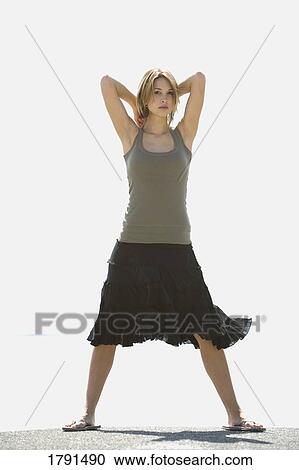 Stock Image - Woman in summer clothing. Fotosearch