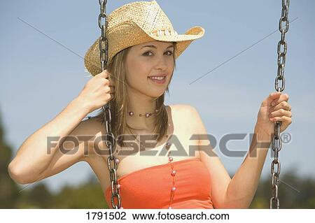 Woman on a swing View Large Photo Image Stock Image - Woman on a swing. Fotosearch