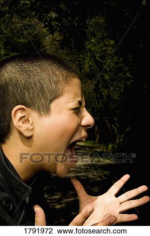 Stock Image - Woman screaming. Fotosearch