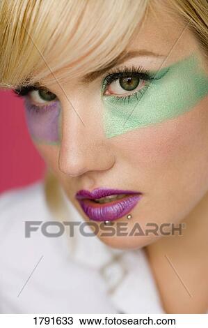 Woman wearing makeup View Large Photo Image Stock Image - Woman wearing makeup. Fotosearch