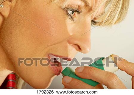 Stock Photograph - Woman with asthma. Fotosearch