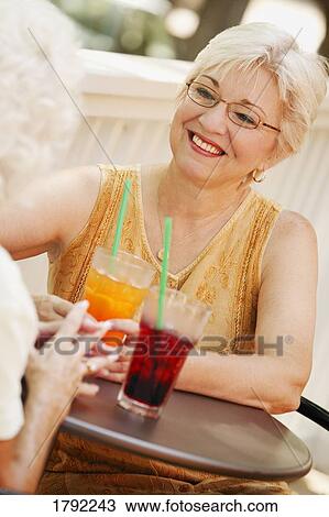 Women visiting View Large Photo Image Stock Image - Women visiting. Fotosearch