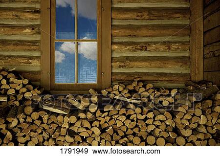 Woodpile inside log building View Large Photo Image Stock Photo - Woodpile inside log building. Fotosearch