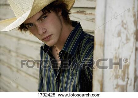Young cowboy View Large Photo Image Stock Photo - Young cowboy. Fotosearch