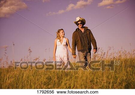 Young man and woman together View Large Photo Image Stock Photograph - Young man and woman together. Fotosearch