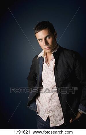 Young man in casual pose View Large Photo Image Stock Image - Young man in casual pose. Fotosearch