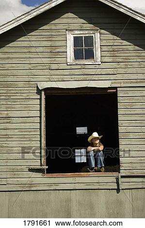 Young woman in loft of barn View Large Photo Image Stock Image - Young woman in loft of barn. Fotosearch