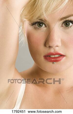 Young woman posing View Large Photo Image Stock Image - Young woman posing. Fotosearch