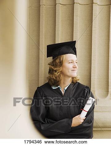 A smiling graduate View Large Photo Image Stock Photograph - A smiling graduate. Fotosearch