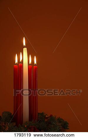 Stock Photo - Advent candles in wreath. Fotosearch