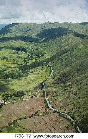 Aerial view of a road running through the Andes mountain range View Large Photo Image Stock Photo - Aerial view of a road running through the Andes mountain range. Fotosearch