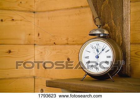 Stock Image - Antique alarm clock. Fotosearch