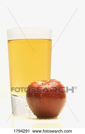 Stock Image - Apple and apple juice. Fotosearch