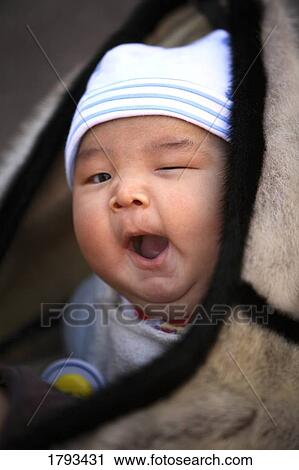 Baby yawning View Large Photo Image Stock Image - Baby yawning. Fotosearch