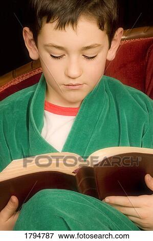 Boy reading the Bible View Large Photo Image Stock Photo - Boy reading the Bible. Fotosearch