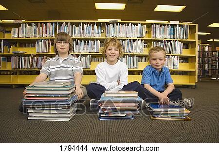 Picture - Boys in a library. Fotosearch