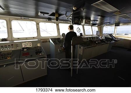 Captain at ship control centre View Large Photo Image Picture - Captain at ship control centre. Fotosearch