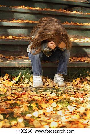 Child crying on steps View Large Photo Image Stock Image - Child crying on steps. Fotosearch