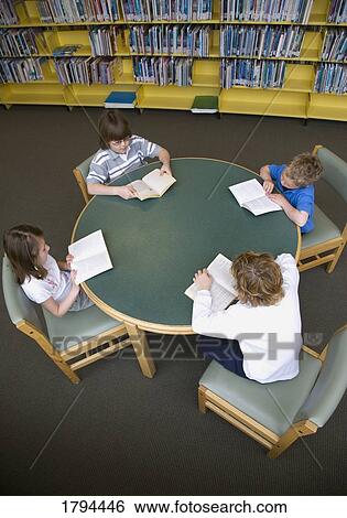 Stock Photograph - Children reading. Fotosearch