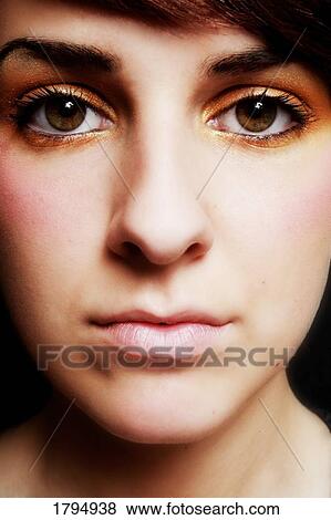 Stock Photo - Closeup of young woman's face. Fotosearch