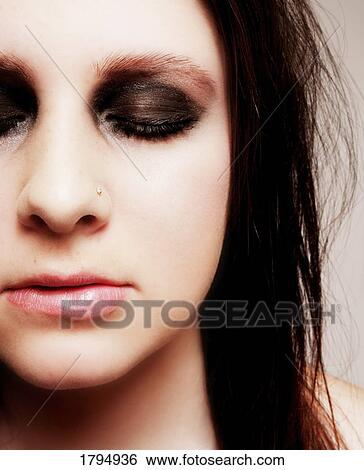 Closeup of young woman's face View Large Photo Image Stock Photograph - Closeup of young woman's face. Fotosearch