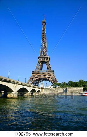 Eiffel tower with bridge in foreground View Large Photo Image Stock Photography - Eiffel tower with bridge in foreground. Fotosearch