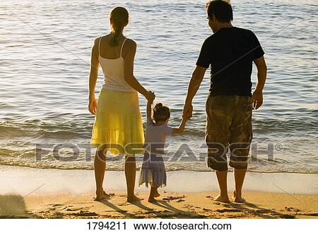 Family at the beach View Large Photo Image Stock Image - Family at the beach. Fotosearch