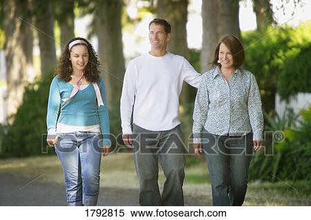 Family walking together View Large Photo Image Stock Photography - Family walking together. Fotosearch