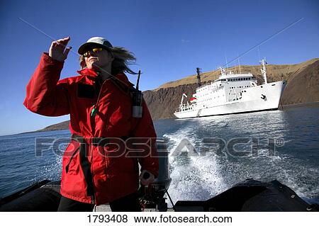 Female guide for High Arctic tourism View Large Photo Image Stock Photo - Female guide for High Arctic tourism. Fotosearch
