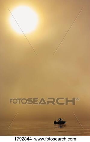 Picture - Fishing boat in fog. Fotosearch