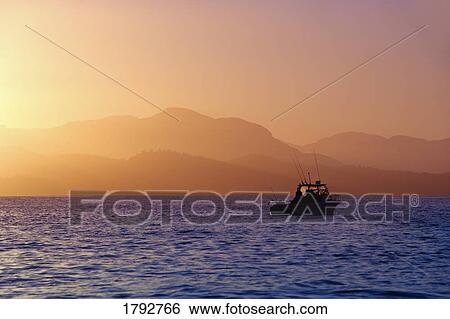 Fishing boat on ocean View Large Photo Image Stock Photograph - Fishing boat on ocean. Fotosearch