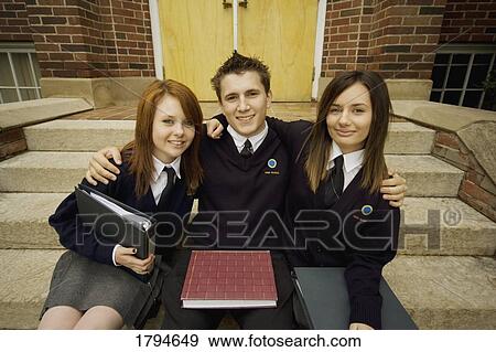 Friends sitting on steps View Large Photo Image Stock Photo - Friends sitting on steps. Fotosearch