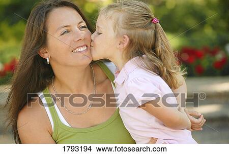 Girl kissing mother View Large Photo Image Picture - Girl kissing mother. Fotosearch