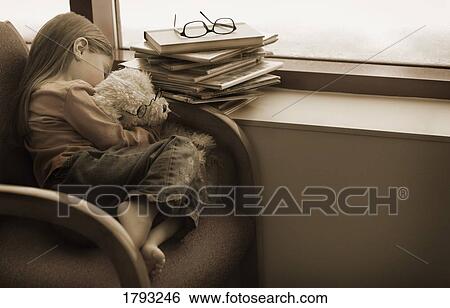 Girl napping with her teddy bear View Large Photo Image Stock Photograph - Girl napping with her teddy bear. Fotosearch