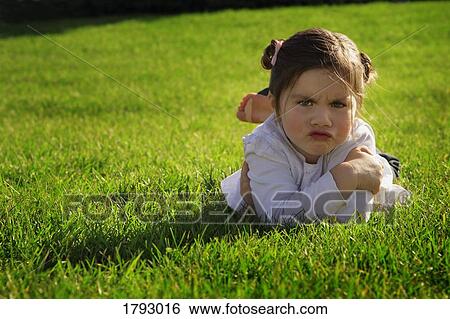 Stock Photograph - Girl pouting. Fotosearch
