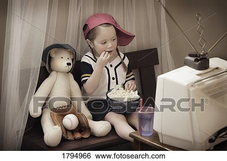 Girl watching television View Large Photo Image Stock Photograph - Girl watching television. Fotosearch