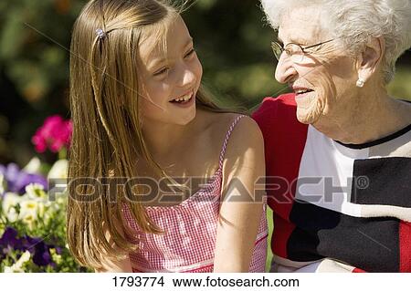 Grandmother and granddaughter View Large Photo Image Picture - Grandmother and granddaughter. Fotosearch
