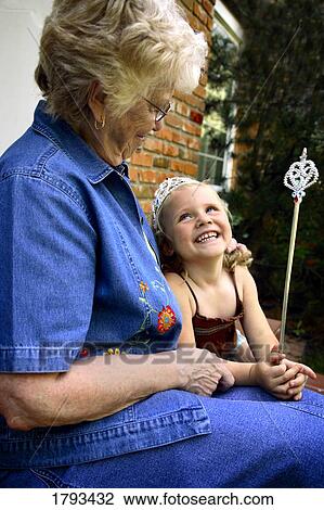 Grandmother with granddaughter dressed up as princess View Large Photo Image Stock Image - Grandmother with granddaughter dressed up as princess. Fotosearch