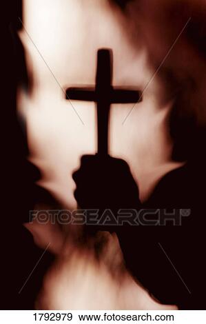 Stock Photo - Hand holding cross . Fotosearch