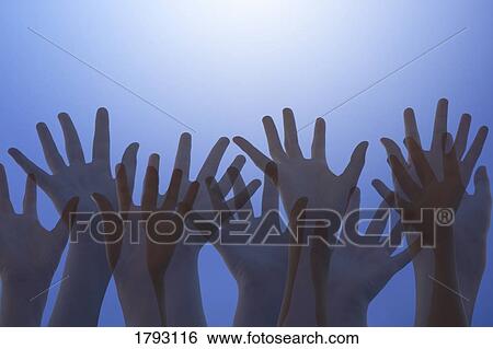 Hands raised in worship View Large Photo Image Stock Photograph - Hands raised in worship. Fotosearch