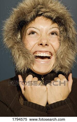 Happy woman with winter coat View Large Photo Image Stock Photography - Happy woman with winter coat. Fotosearch