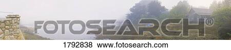 Stock Photo - Inlet by village. Fotosearch