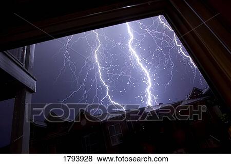 Lightening storm over homes View Large Photo Image Stock Photo - Lightening storm over homes. Fotosearch