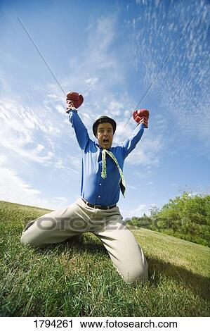 Man giving victory shout View Large Photo Image Stock Image - Man giving victory shout. Fotosearch