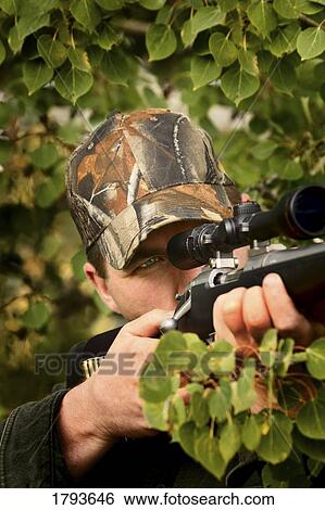 Man hunting View Large Photo Image Stock Photograph - Man hunting. Fotosearch