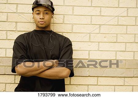 Stock Photo - Man listening to music. Fotosearch