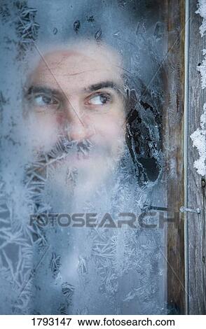 Man looking through frosted glass View Large Photo Image Stock Photo - Man looking through frosted glass. Fotosearch