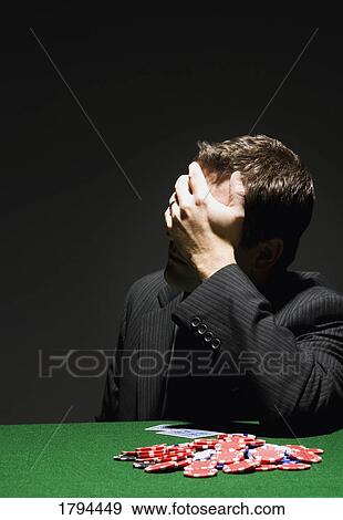 Man losing at poker View Large Photo Image Stock Photo - Man losing at poker. Fotosearch